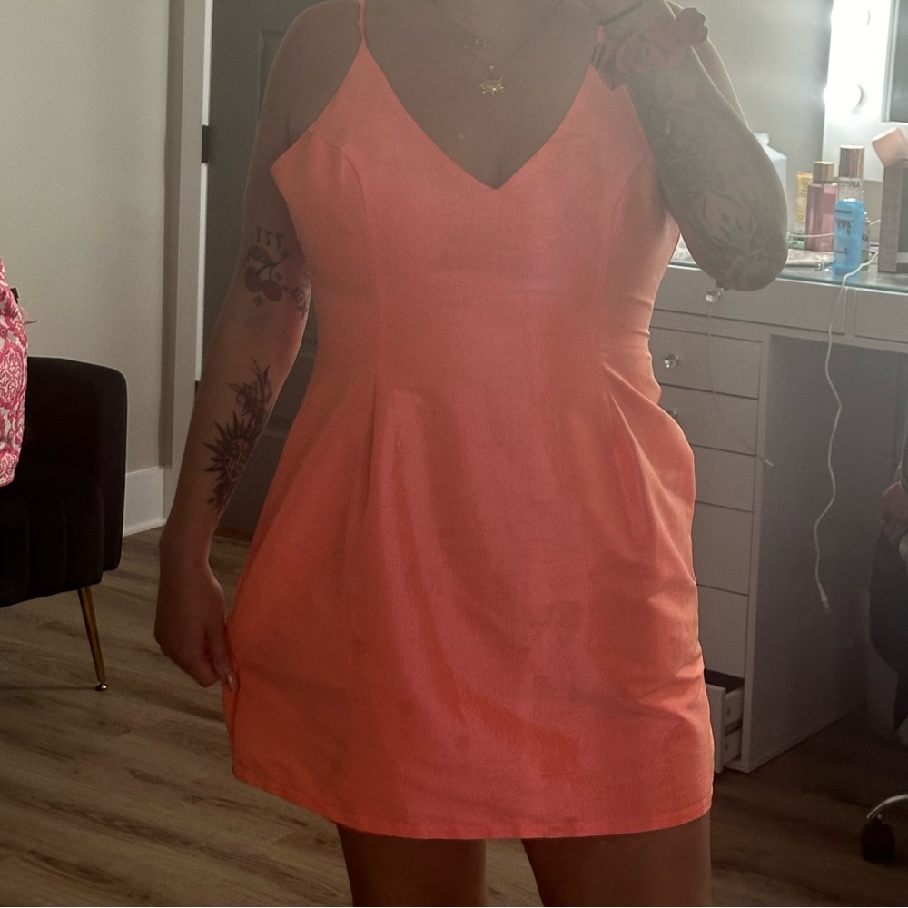 cute and fitting being pink/ neon pink dress